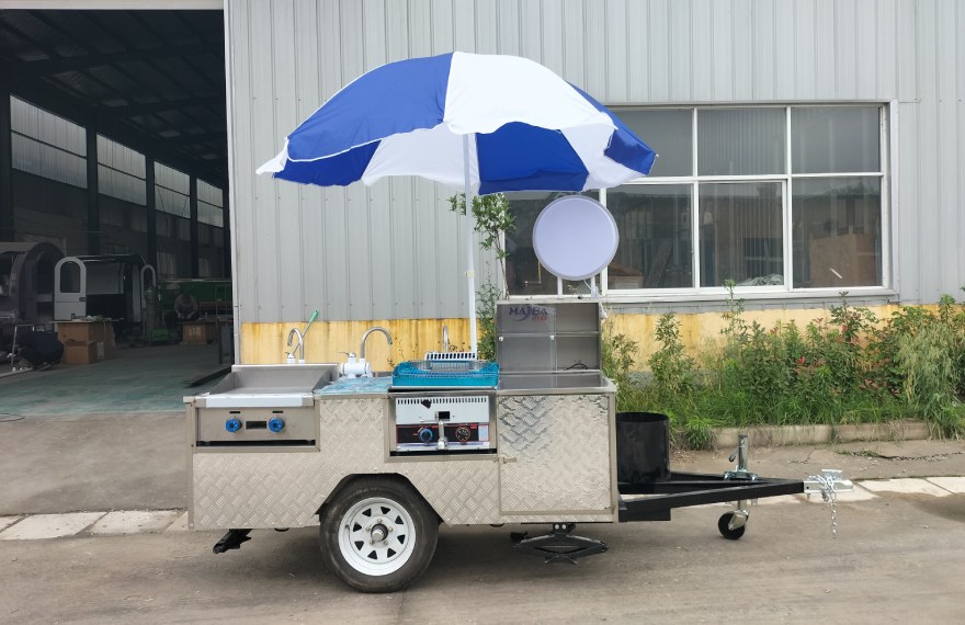 hot dog cart with refrigerator